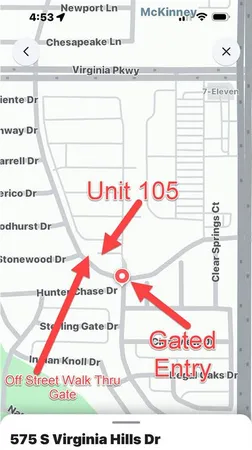 a view of park with large trees