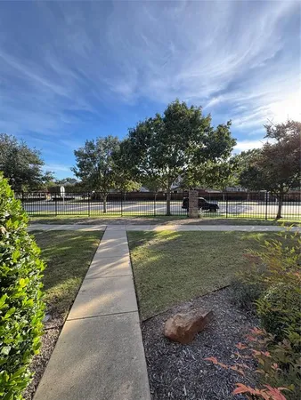 an aerial view of a house with outdoor space