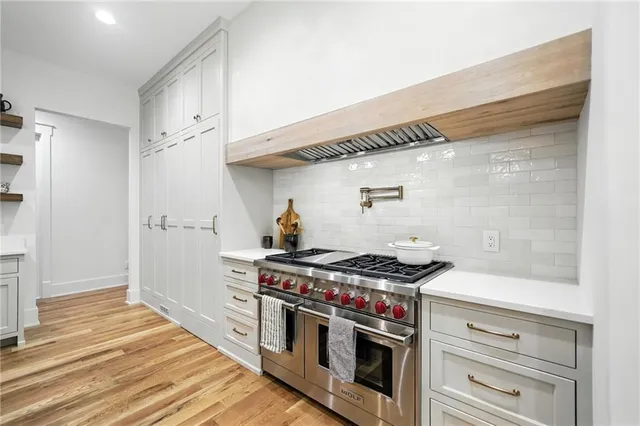 a view of a balcony with wooden floor