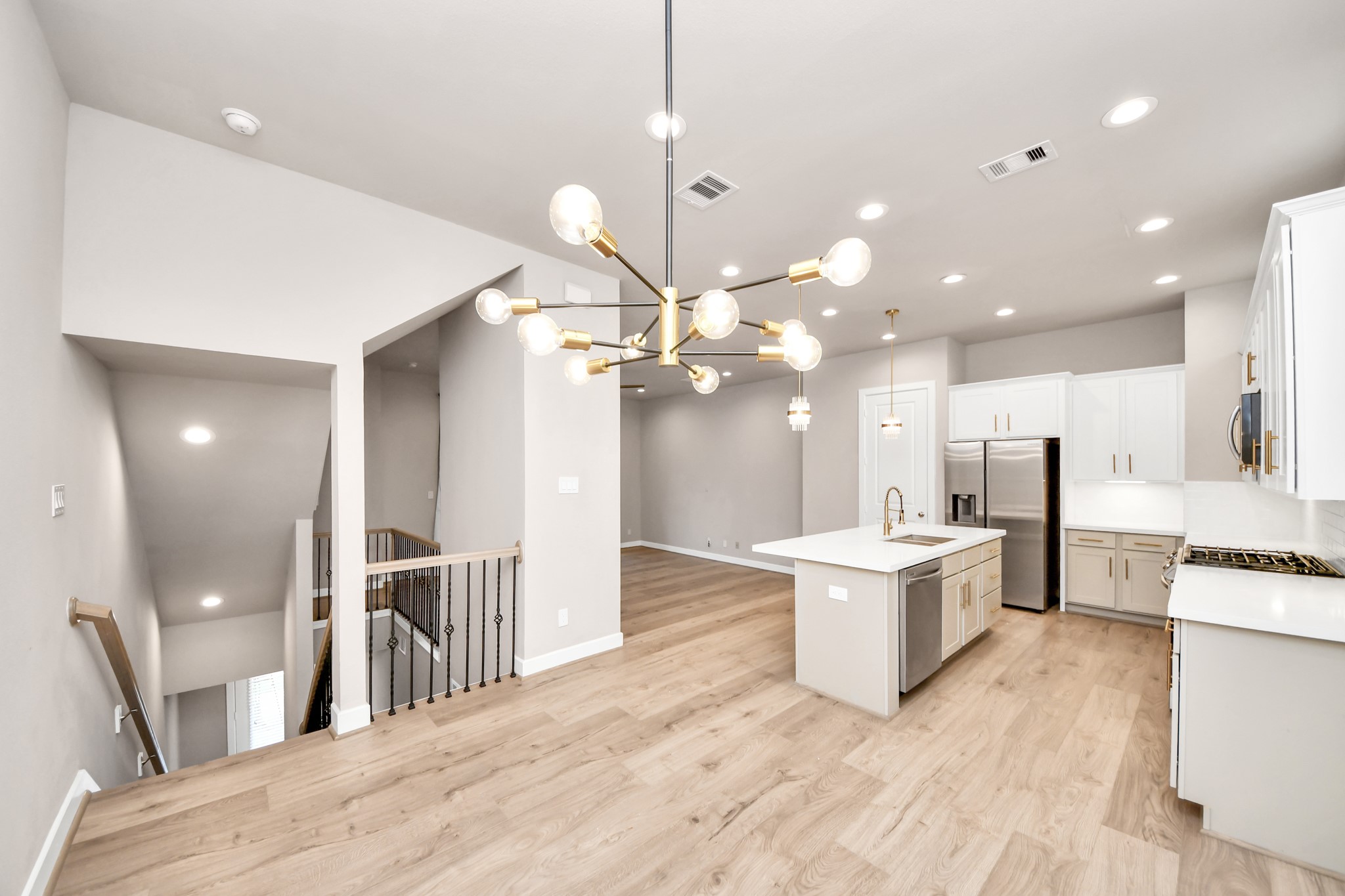 2114 Stuart Street Houston, TX 77004 - Photo 36 of 39 a large kitchen with a table and chairs