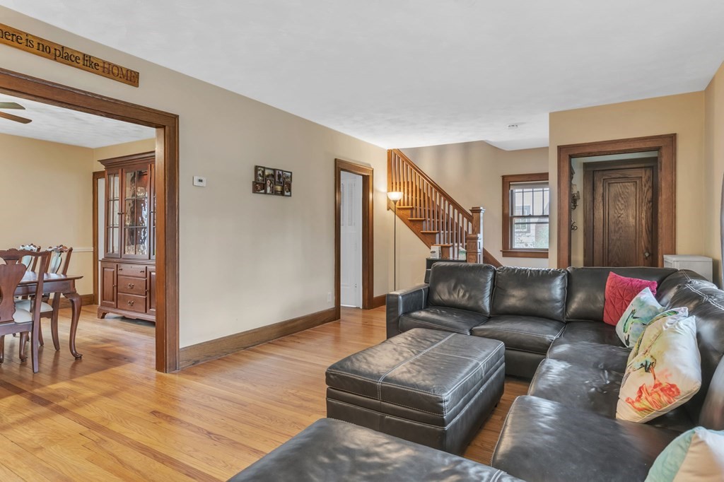 108 Manchester Terrace Springfield, MA 01108 - Photo 11 of 40 a living room with furniture and a wooden floor