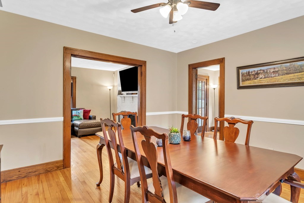 108 Manchester Terrace Springfield, MA 01108 - Photo 15 of 40 a dining room with furniture and wooden floor