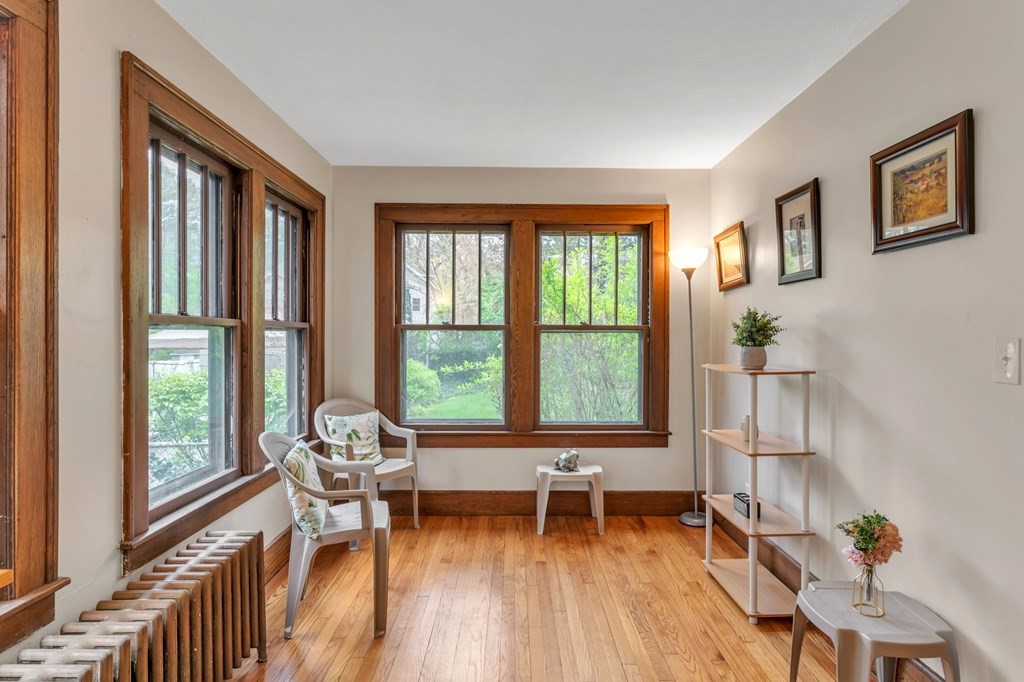 108 Manchester Terrace Springfield, MA 01108 - Photo 17 of 40 a living room filled with furniture and a large window