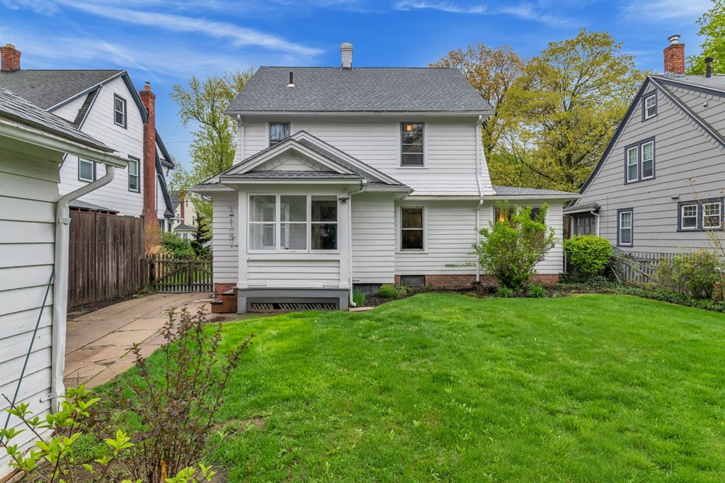 108 Manchester Terrace Springfield, MA 01108 - Photo 3 of 40 a front view of a house with a garden