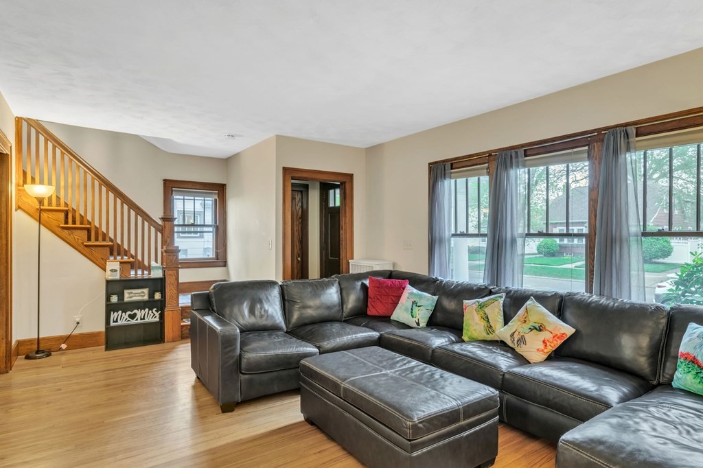 108 Manchester Terrace Springfield, MA 01108 - Photo 9 of 40 a living room with furniture and a large window
