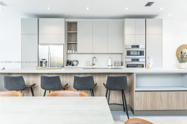 a bathroom with a walk in closet and a window