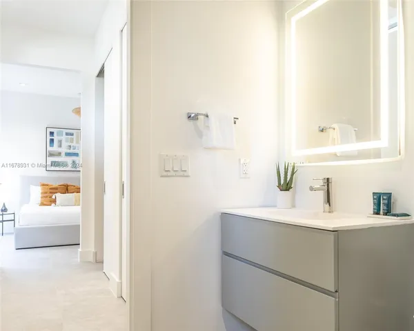 a view of a workspace with furniture