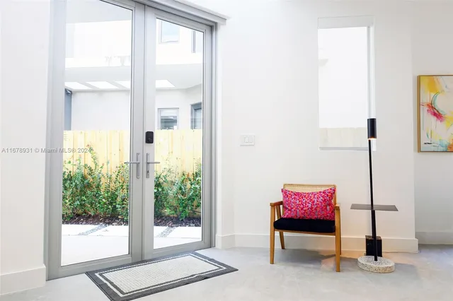 a living room with a couch and a table