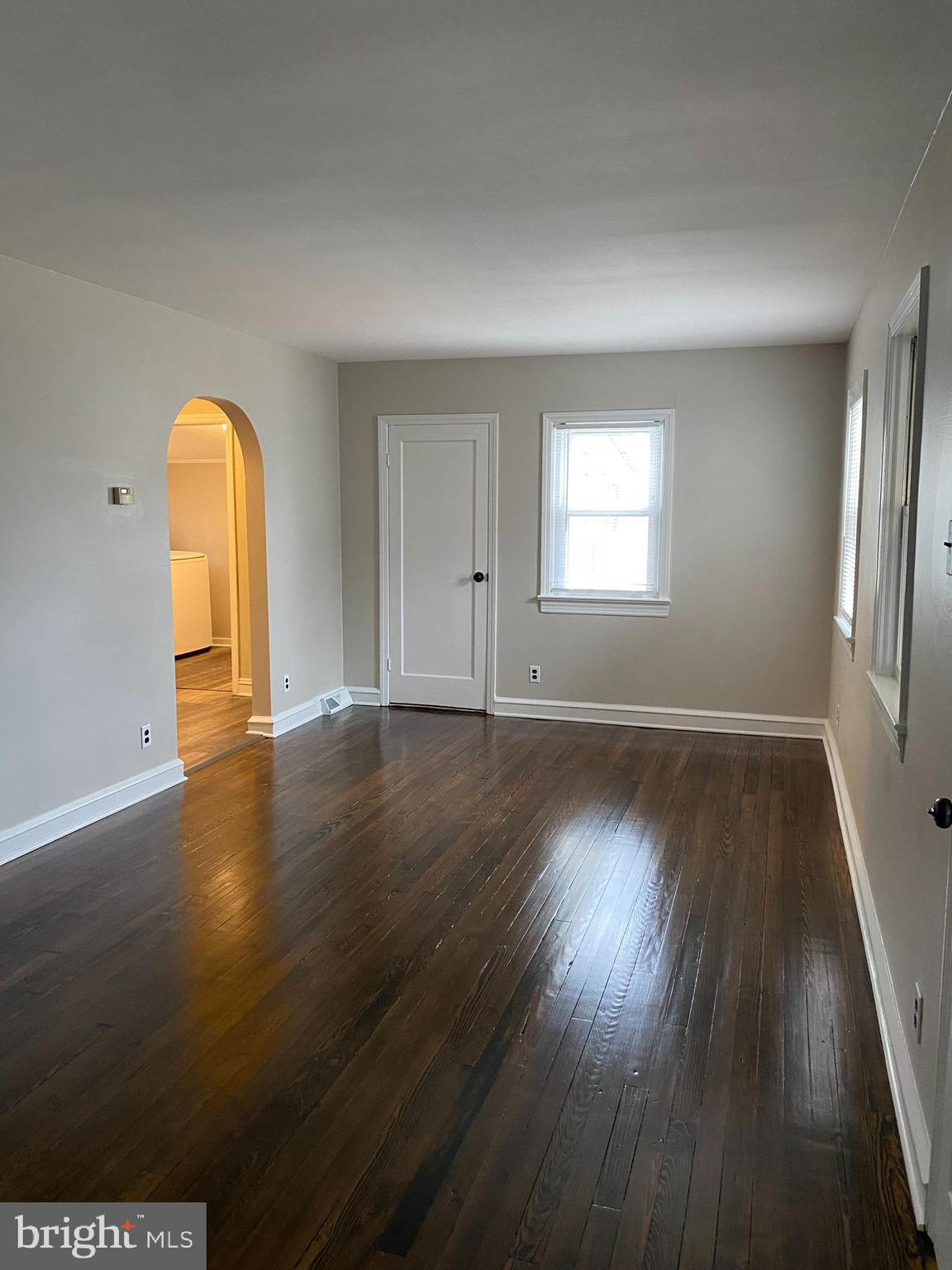 258 Birch Street Penns Grove, NJ 08069 - Photo 11 of 41 an empty room with wooden floor and window