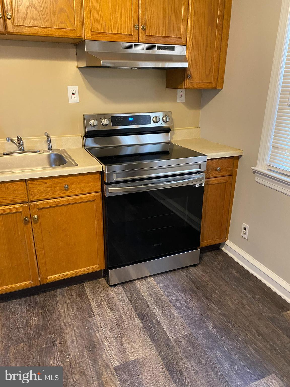 258 Birch Street Penns Grove, NJ 08069 - Photo 16 of 41 a stove top oven sitting inside of a kitchen