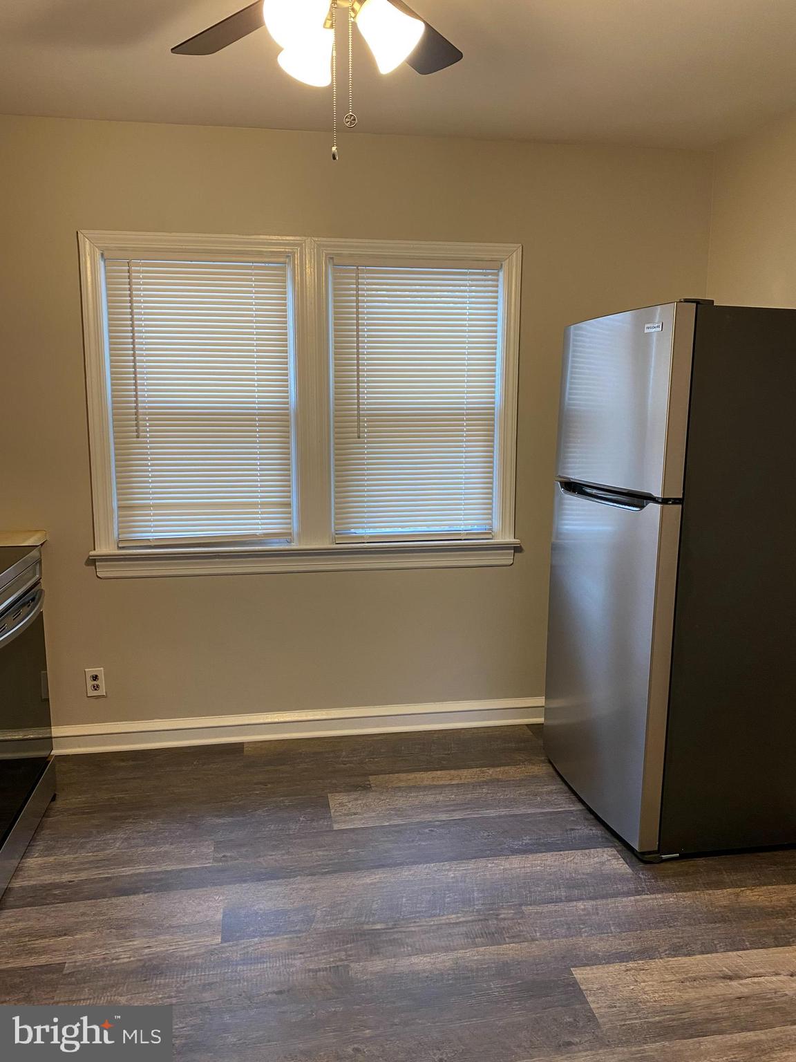 258 Birch Street Penns Grove, NJ 08069 - Photo 17 of 41 a view of empty room with wooden floor and fan