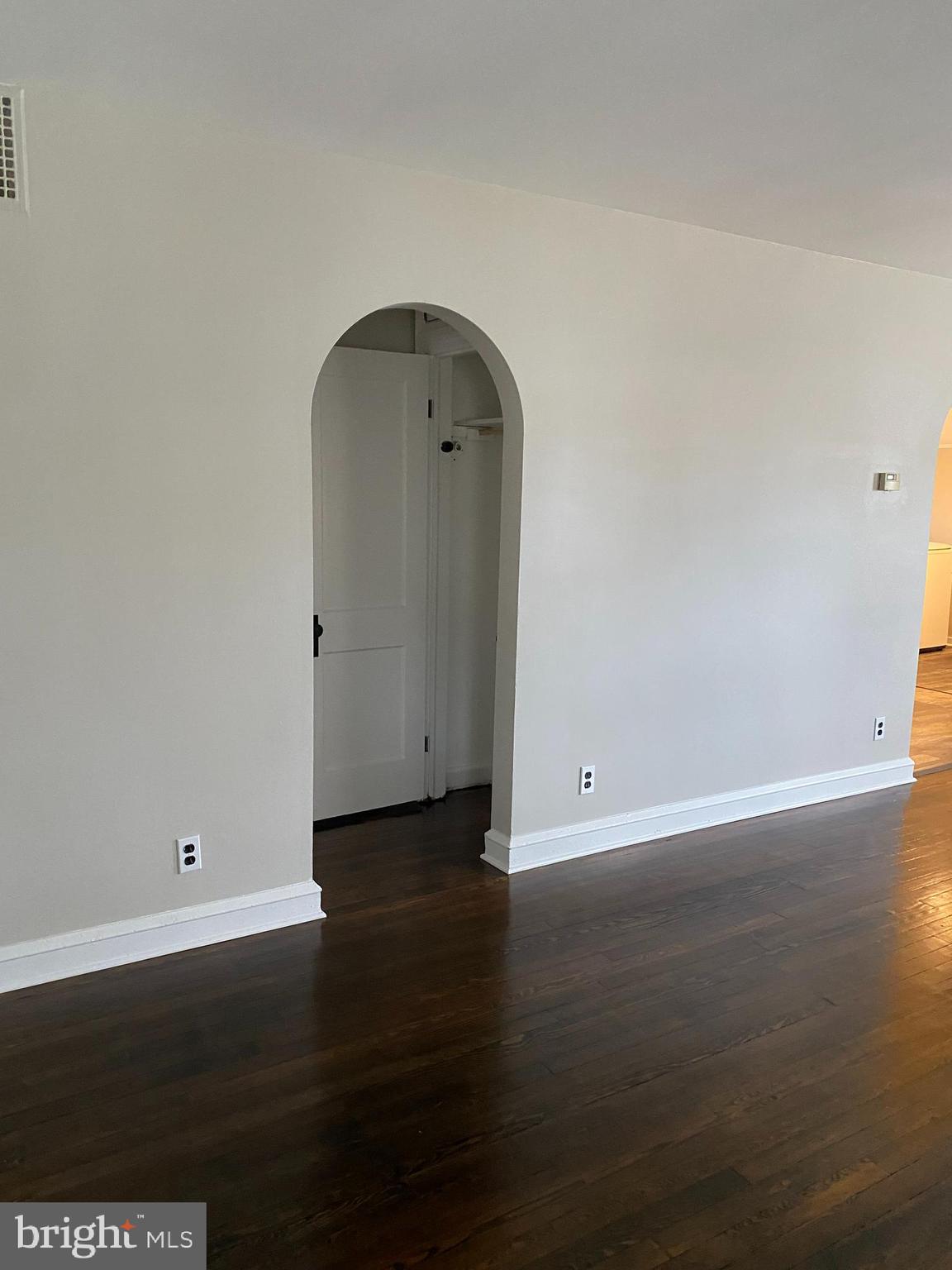 258 Birch Street Penns Grove, NJ 08069 - Photo 25 of 41 an empty room with wooden floor
