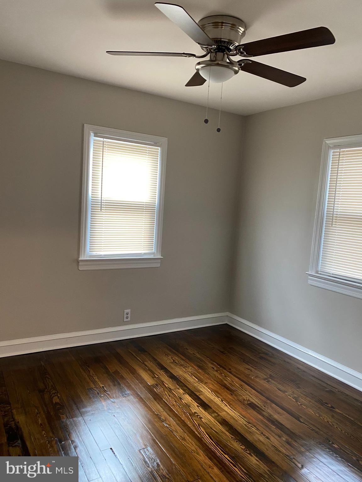 258 Birch Street Penns Grove, NJ 08069 - Photo 28 of 41 a view of empty room with wooden floor and fan