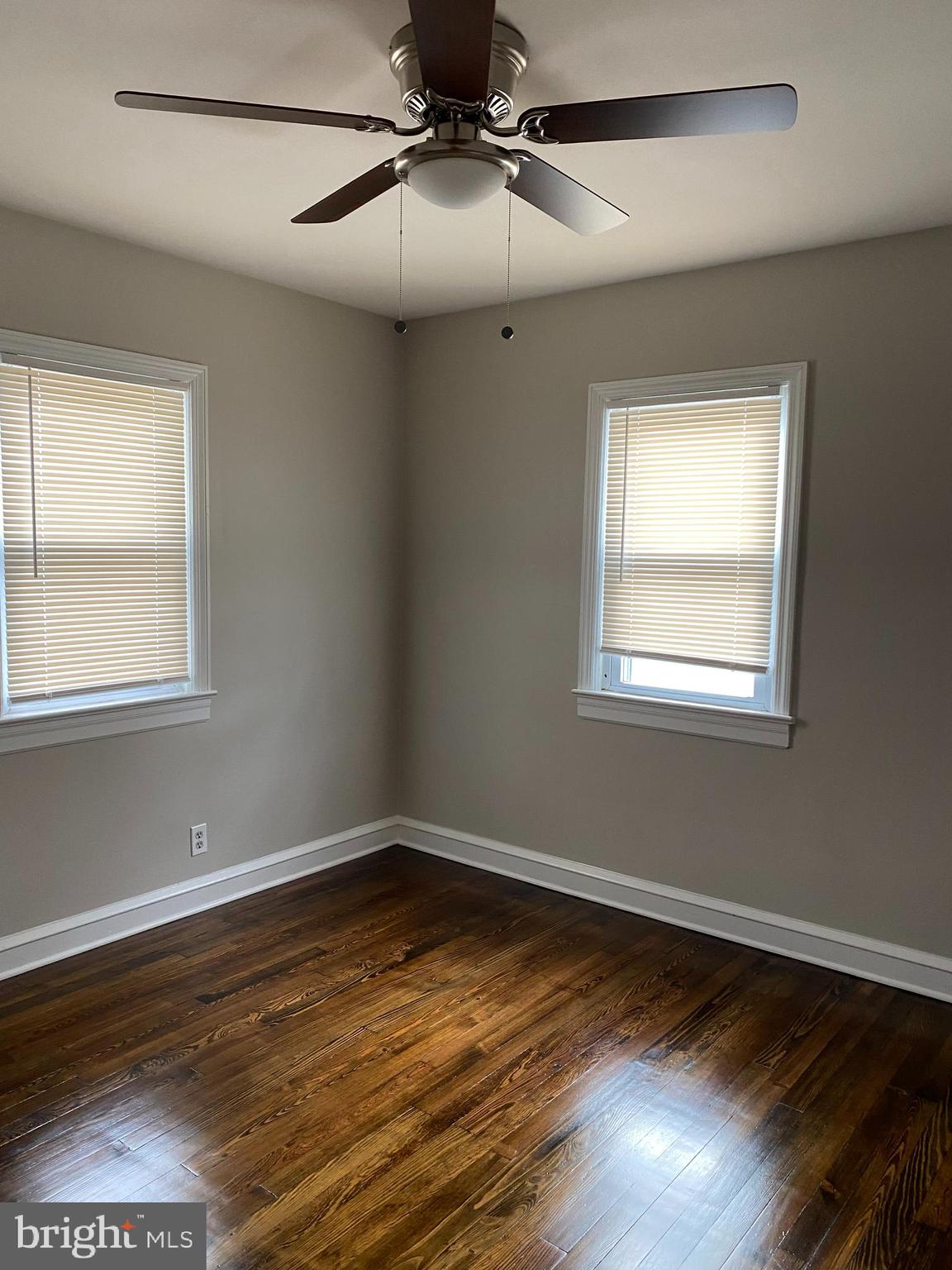 258 Birch Street Penns Grove, NJ 08069 - Photo 30 of 41 a view of empty room with wooden floor and fan