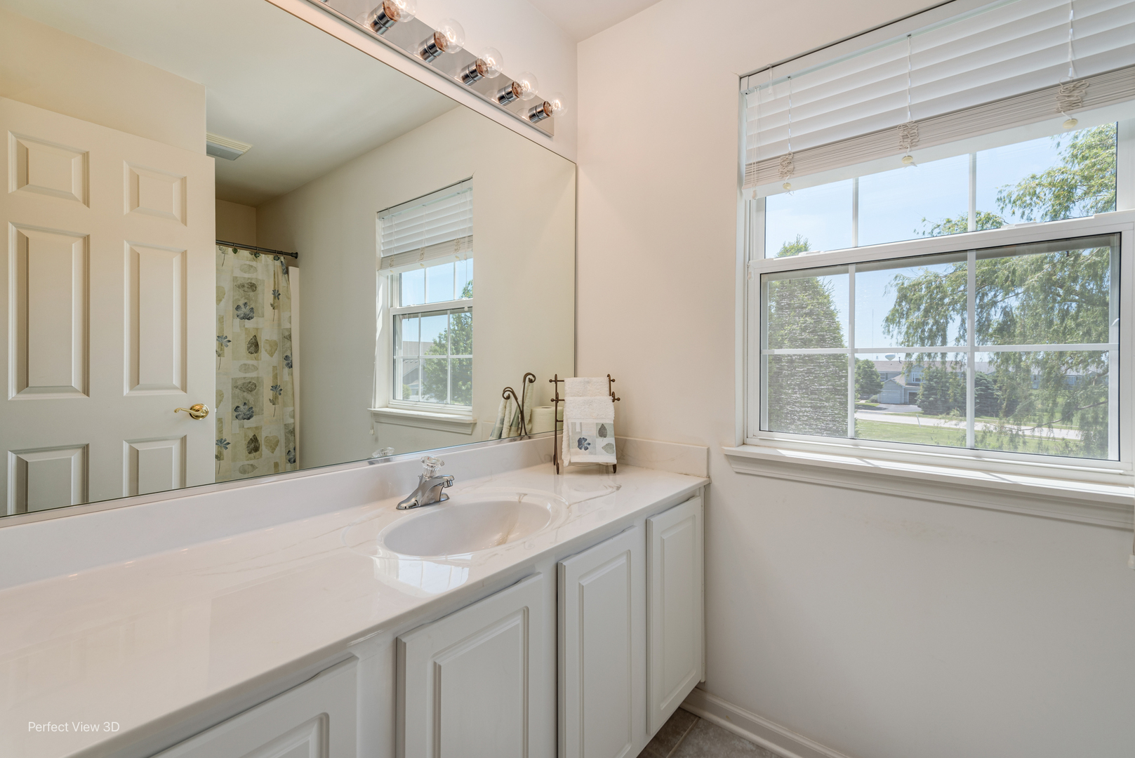 1606 Creekside Circle Minooka, IL 60447 - Photo 16 of 30 a bathroom with a sink and a window