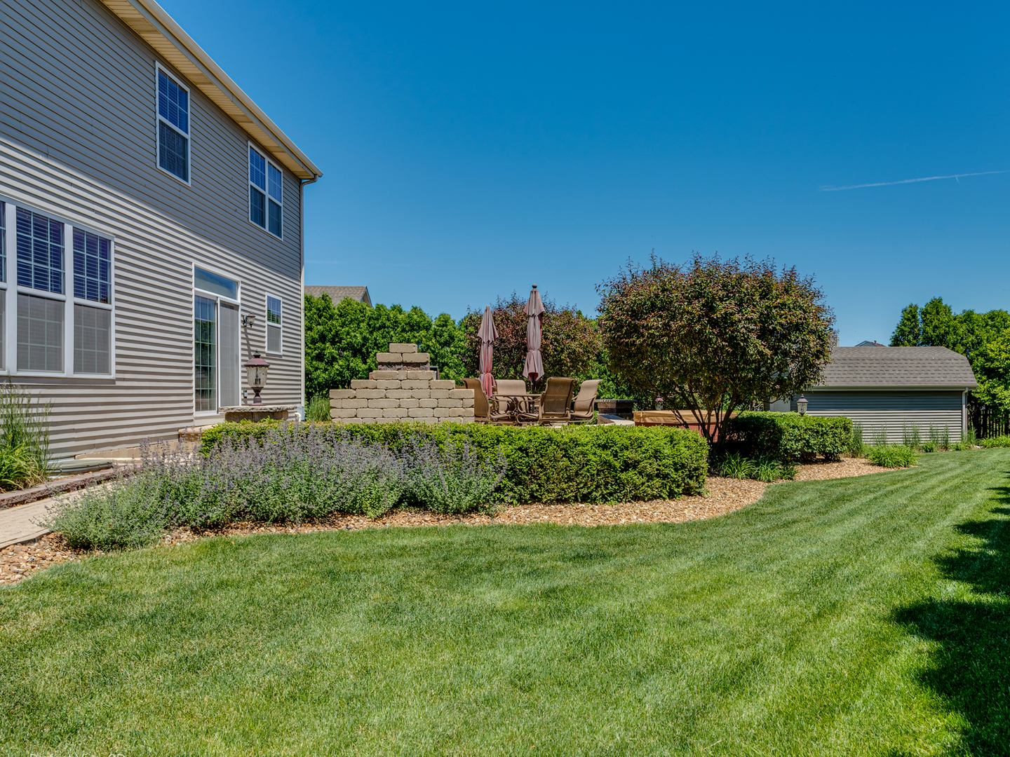 1606 Creekside Circle Minooka, IL 60447 - Photo 22 of 30 a view of a house with a yard