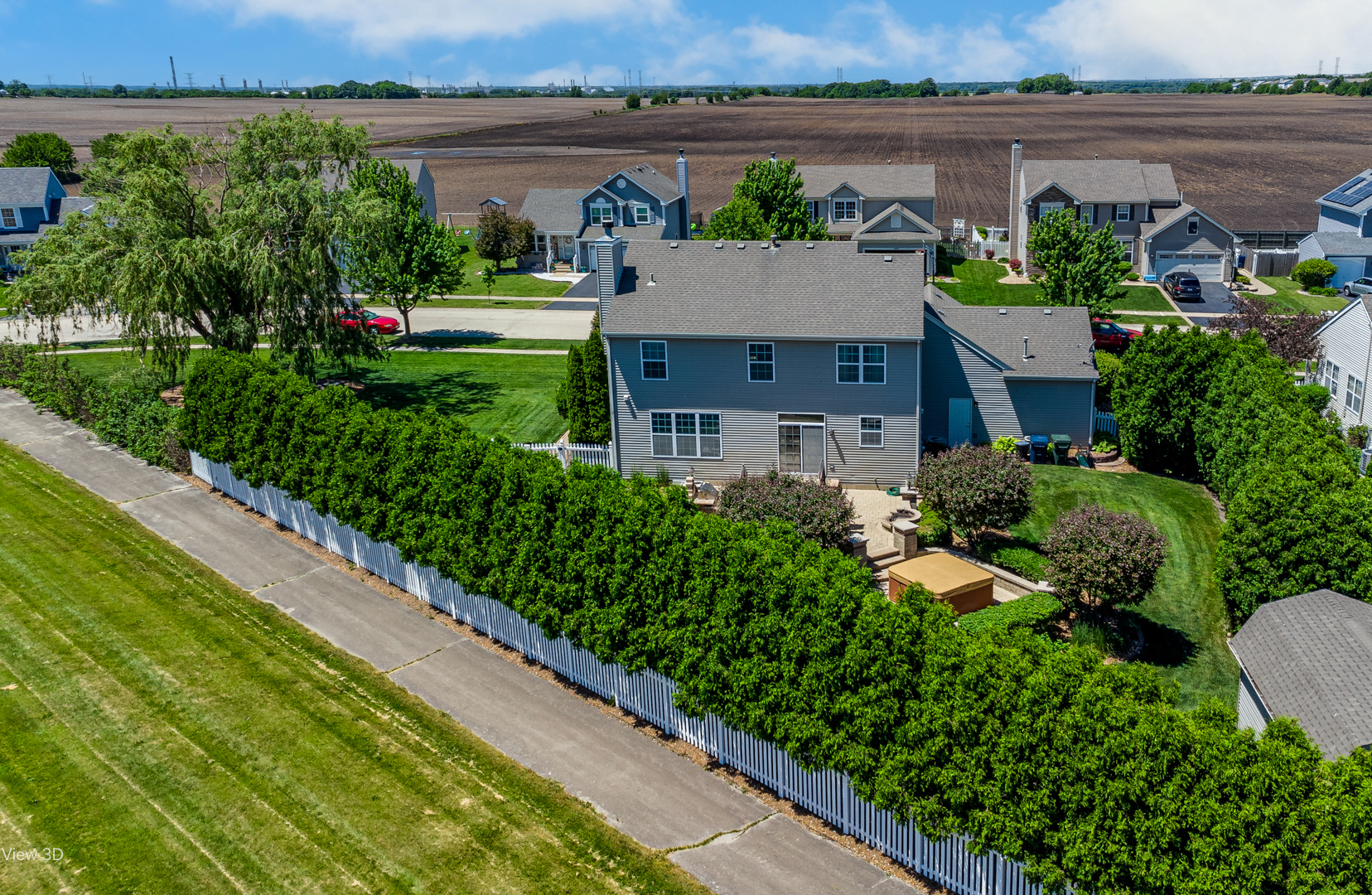 1606 Creekside Circle Minooka, IL 60447 - Photo 23 of 30 a view of a house with a garden and lake view
