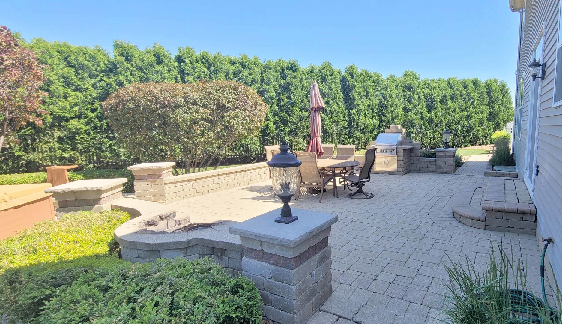 1606 Creekside Circle Minooka, IL 60447 - Photo 28 of 30 a view of a patio with couches chairs and a table and chairs