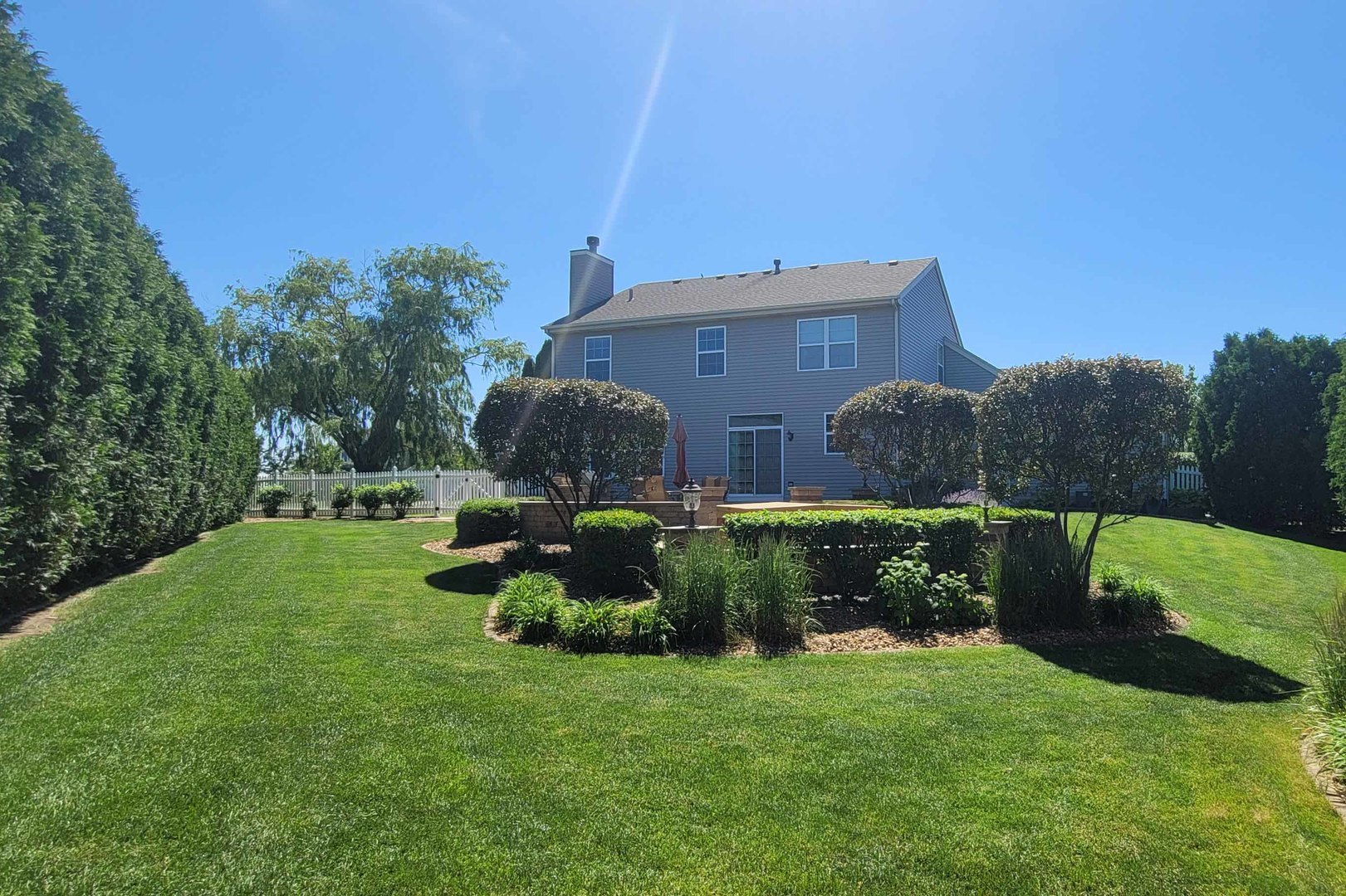 1606 Creekside Circle Minooka, IL 60447 - Photo 30 of 30 a view of a house with backyard and garden