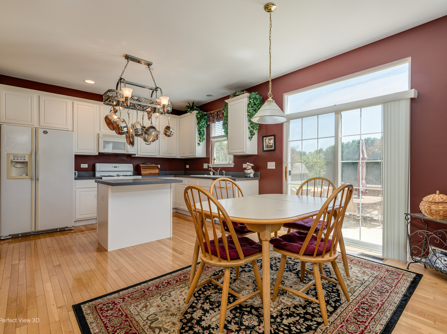 1606 Creekside Circle Minooka, IL 60447 - Photo 9 of 30 a view of a dining room with furniture window and wooden floor