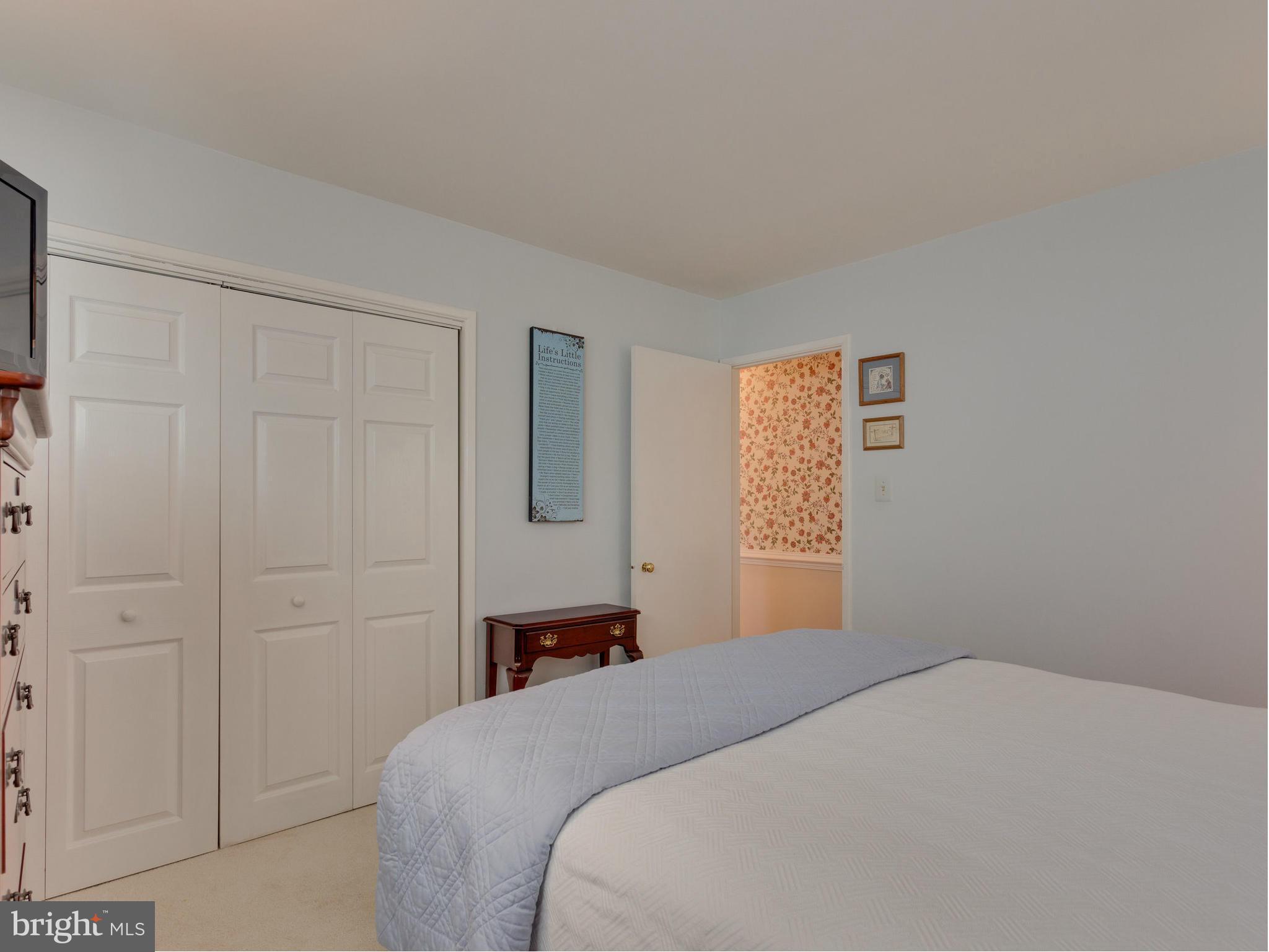 5218 Garner Street Springfield, VA 22151 - Photo 14 of 29 a bedroom with a bed and a window