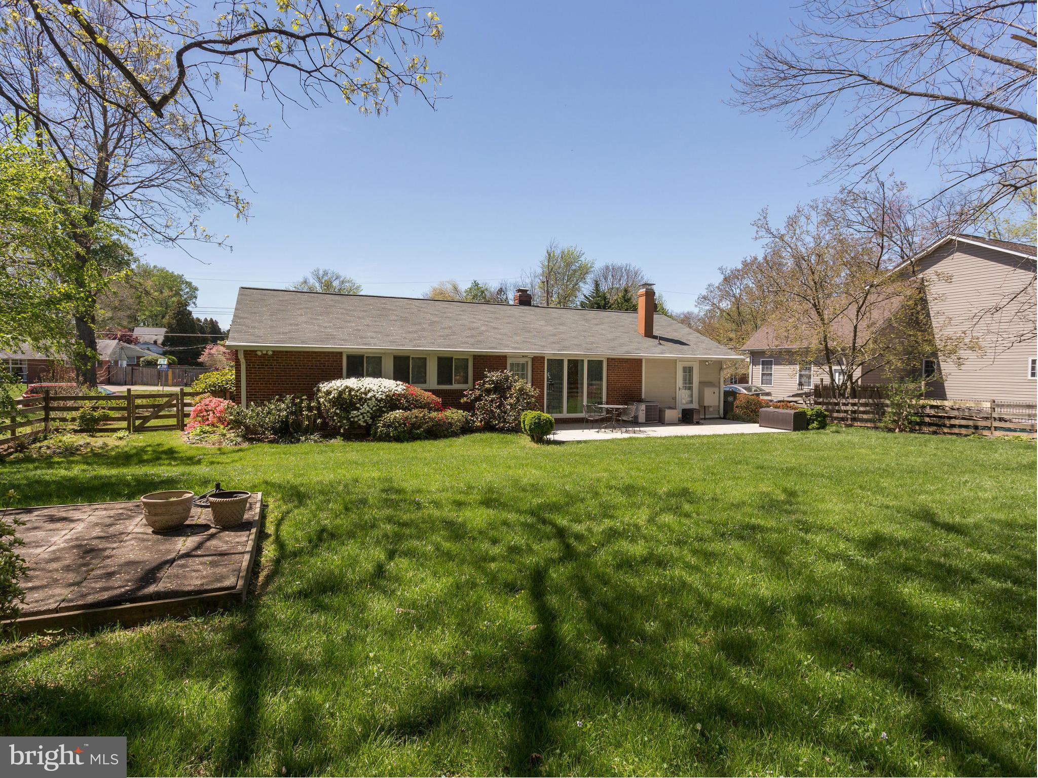 5218 Garner Street Springfield, VA 22151 - Photo 26 of 29 a view of a house with a big yard