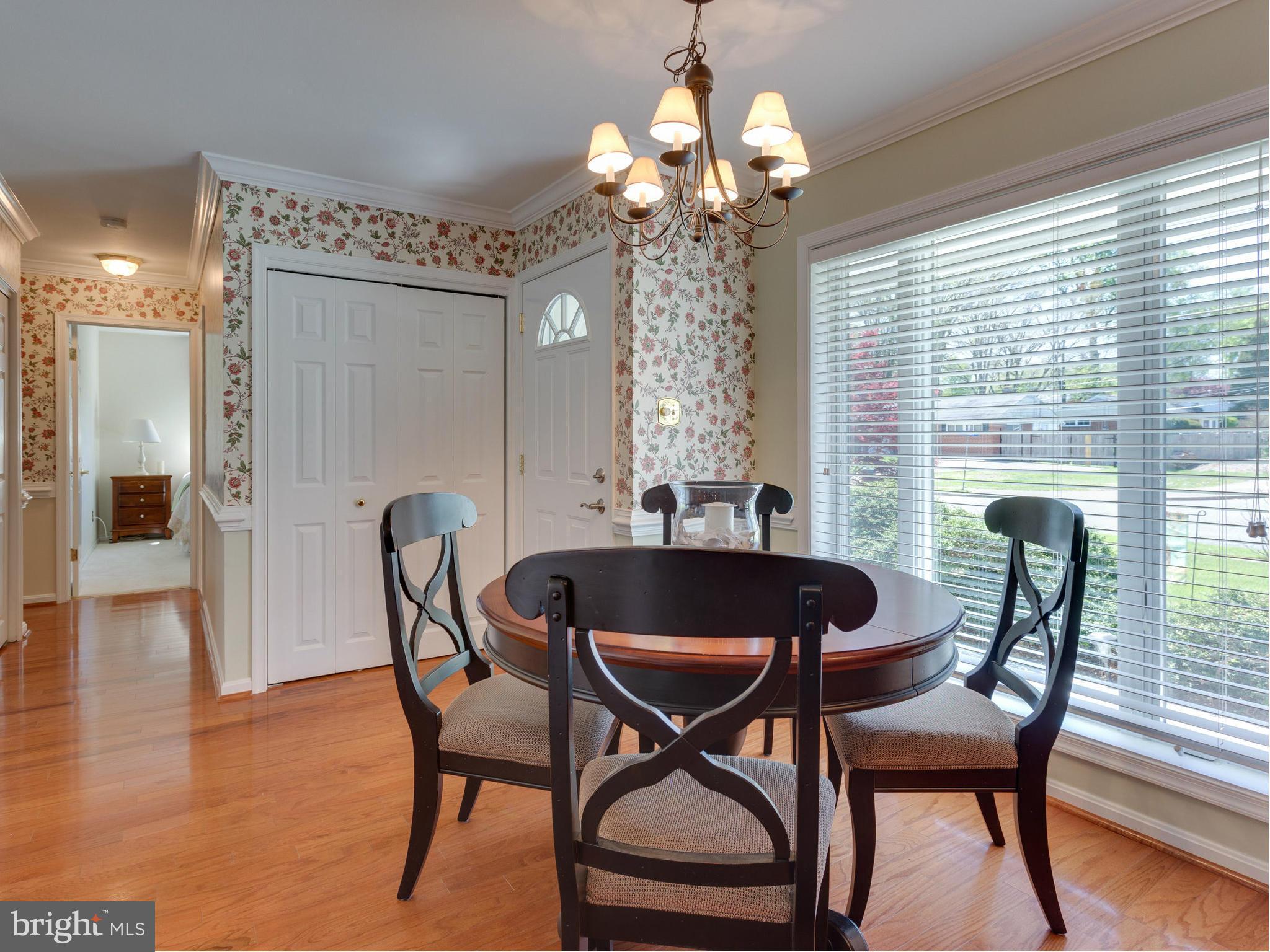 5218 Garner Street Springfield, VA 22151 - Photo 6 of 29 a view of a dining room with furniture window and wooden floor