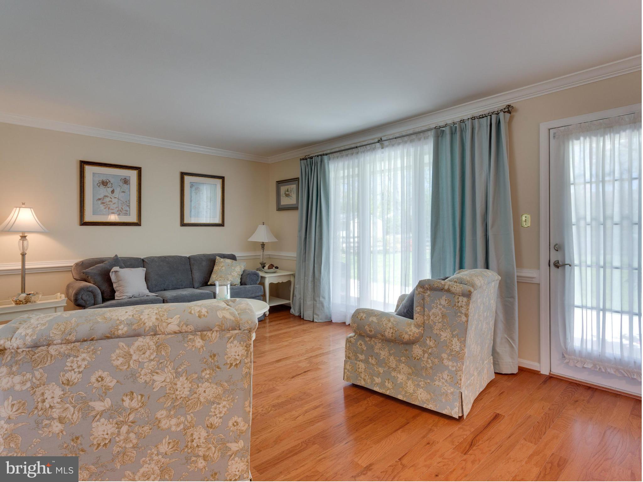 5218 Garner Street Springfield, VA 22151 - Photo 10 of 29 a living room with furniture and large windows