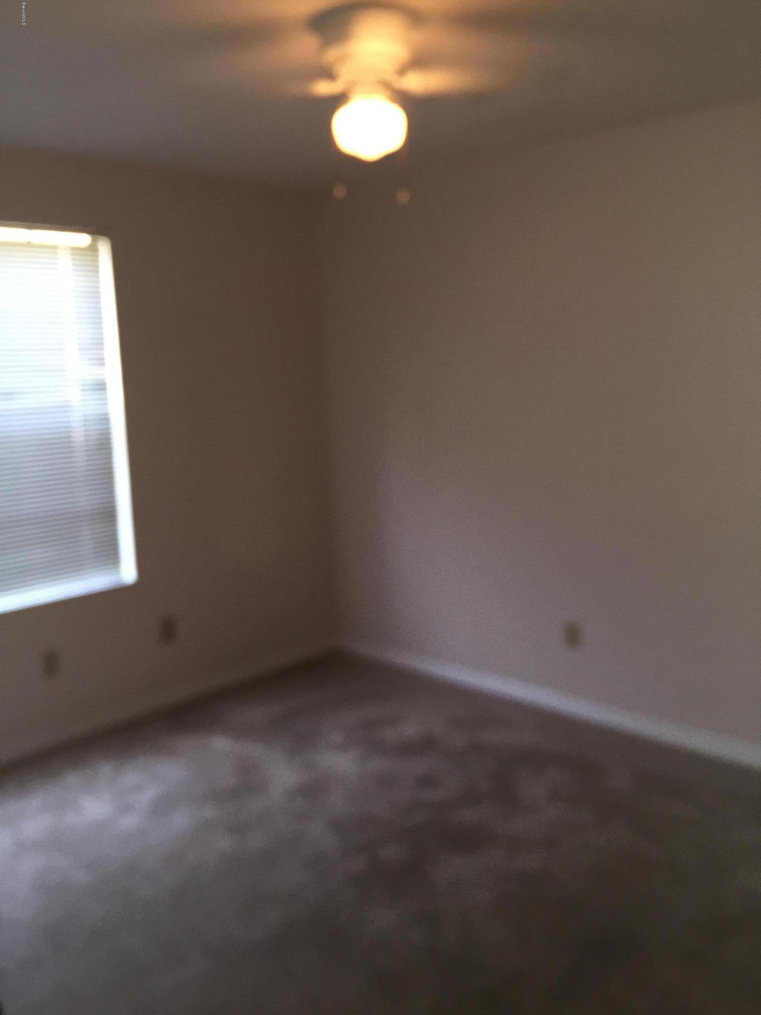 7667 North Wickham Road, Unit 101 Melbourne, FL 32940 - Photo 3 of 13 Bedroom 1