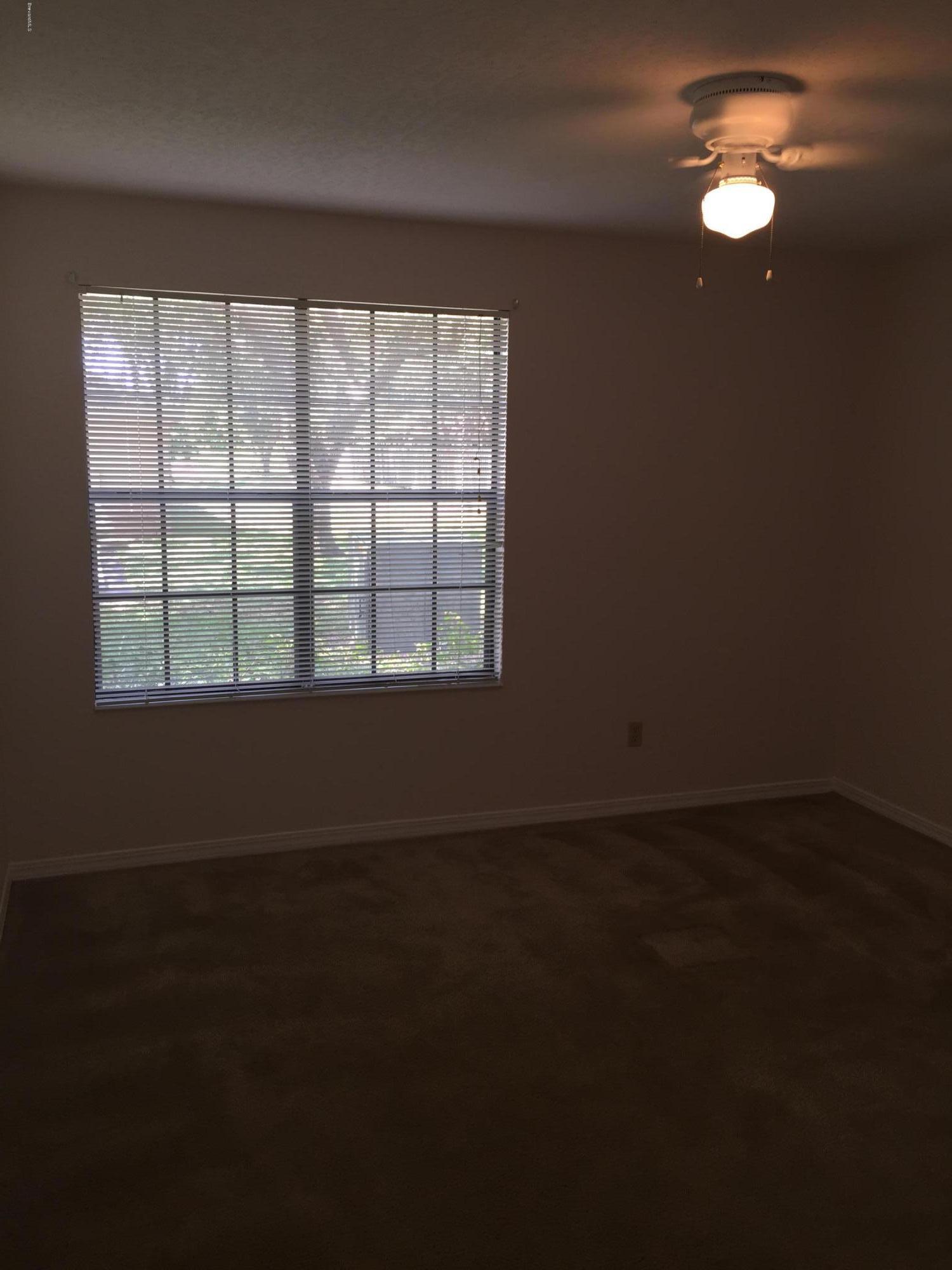 7667 North Wickham Road, Unit 101 Melbourne, FL 32940 - Photo 5 of 13 Bedroom 2