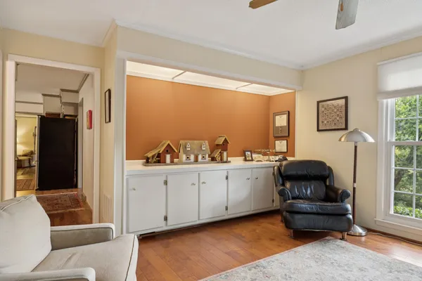 a living room with furniture and a window