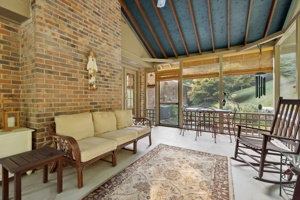 a living room with a couch and a table