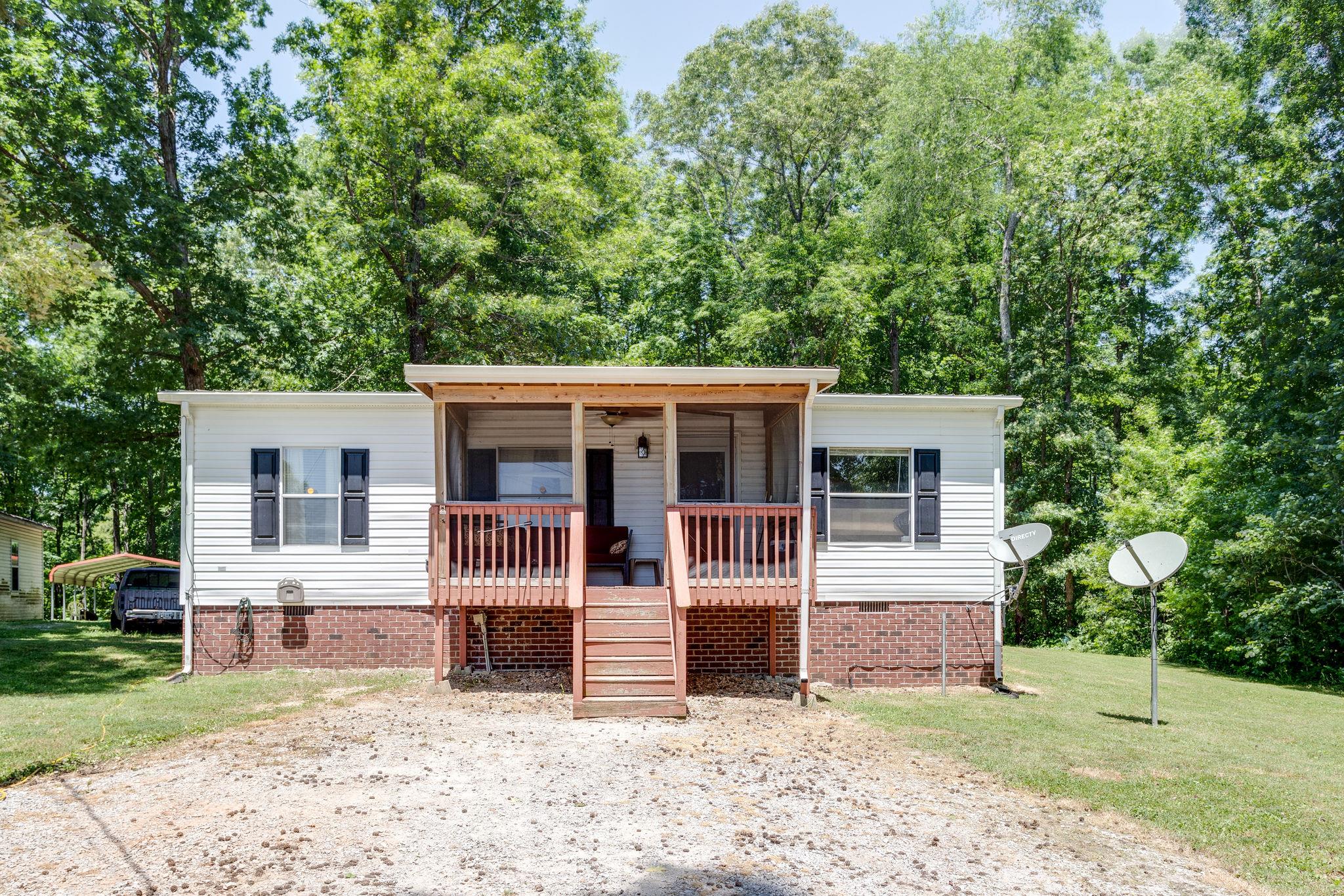 204 Screamer Road Lynnville, TN 38472 - Photo 2 of 18 This home offers a Screened-In Front Porch