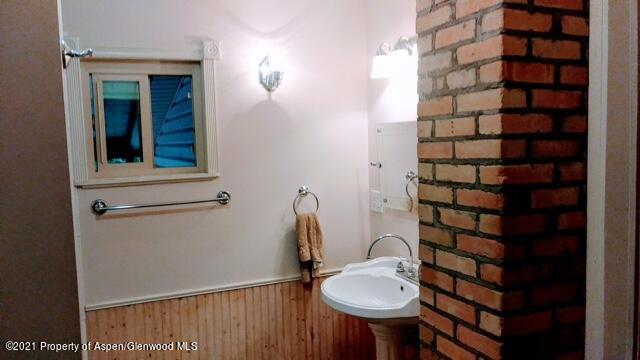 207 Ash Avenue Rifle, CO 81650 - Photo 16 of 21 a bathroom with a sink toilet and shower