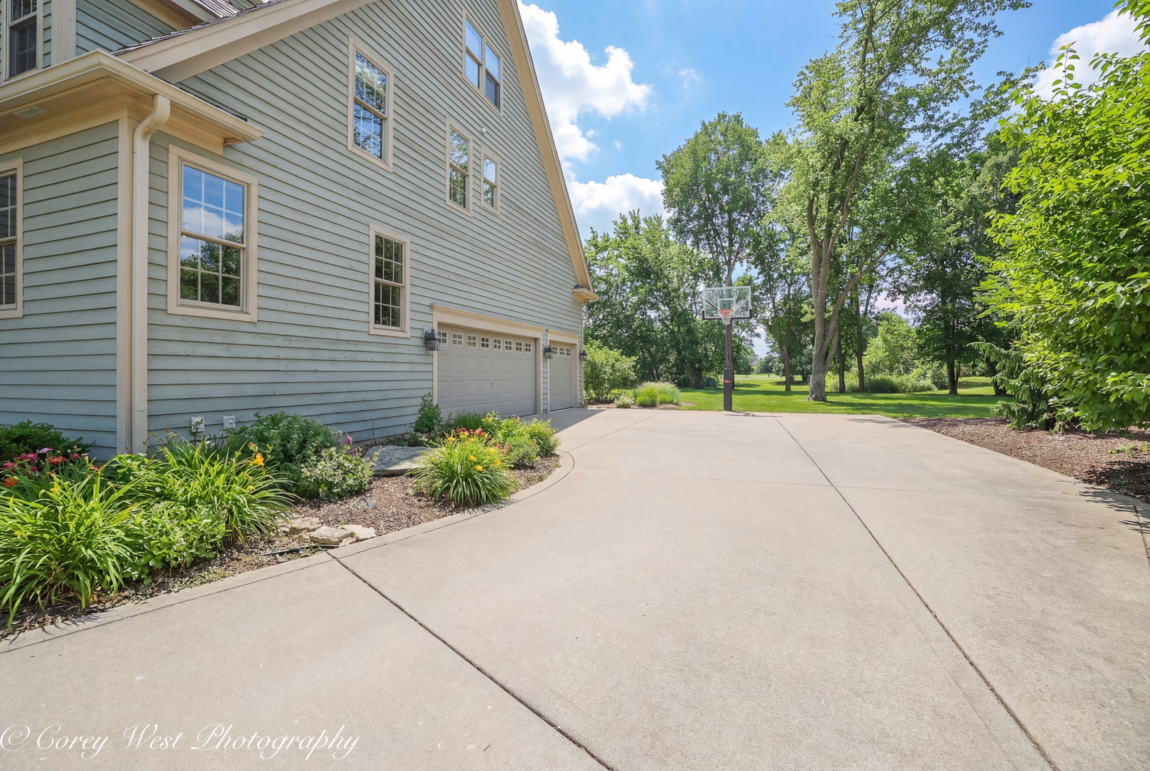 N004 Alexander Drive Geneva, IL 60134 - Photo 66 of 75 a view of a house with a yard and plants