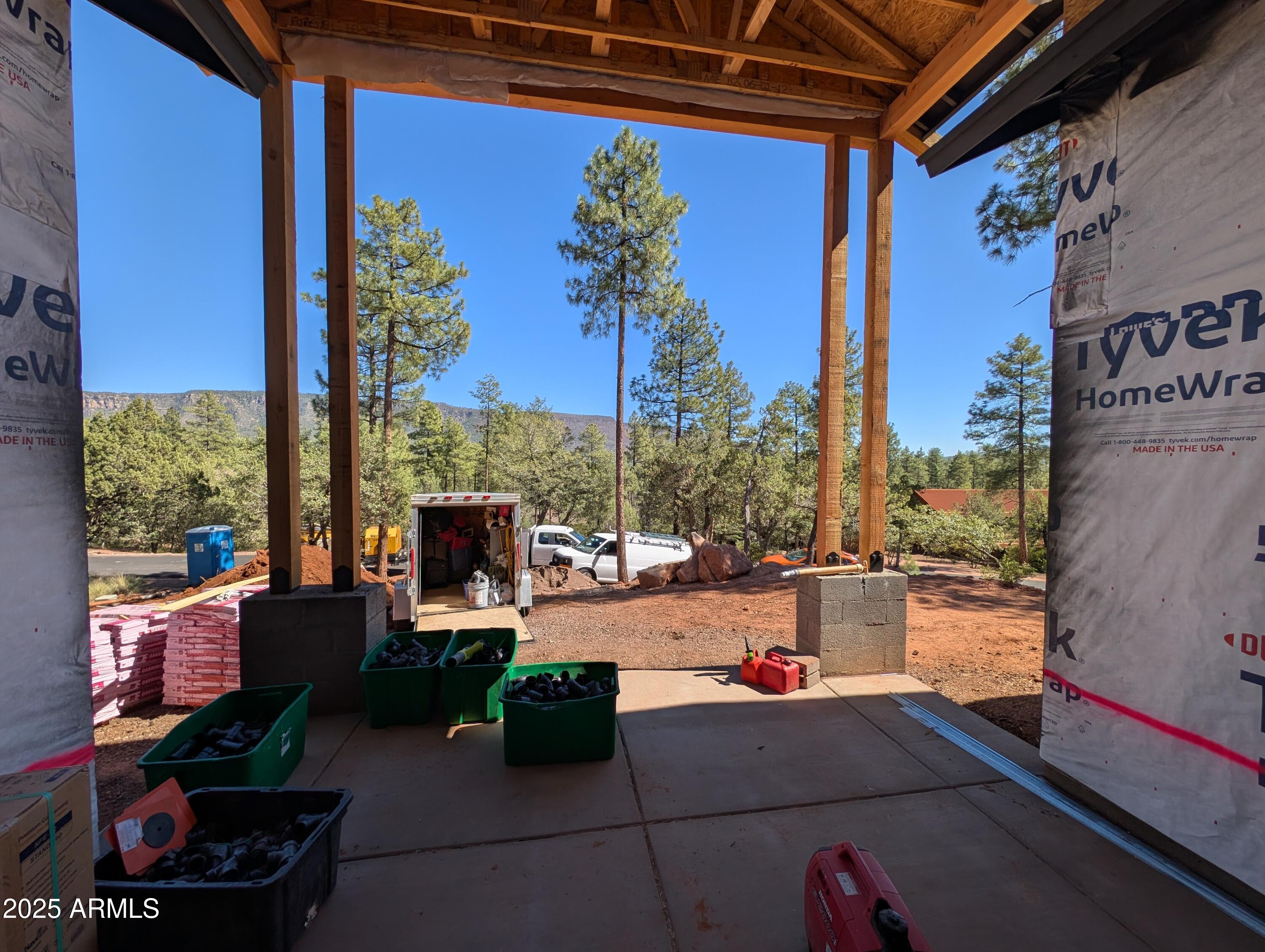 4165 West W Forest Pine, AZ 85544 - Photo 12 of 24 a building outdoor space with patio furniture and potted plants