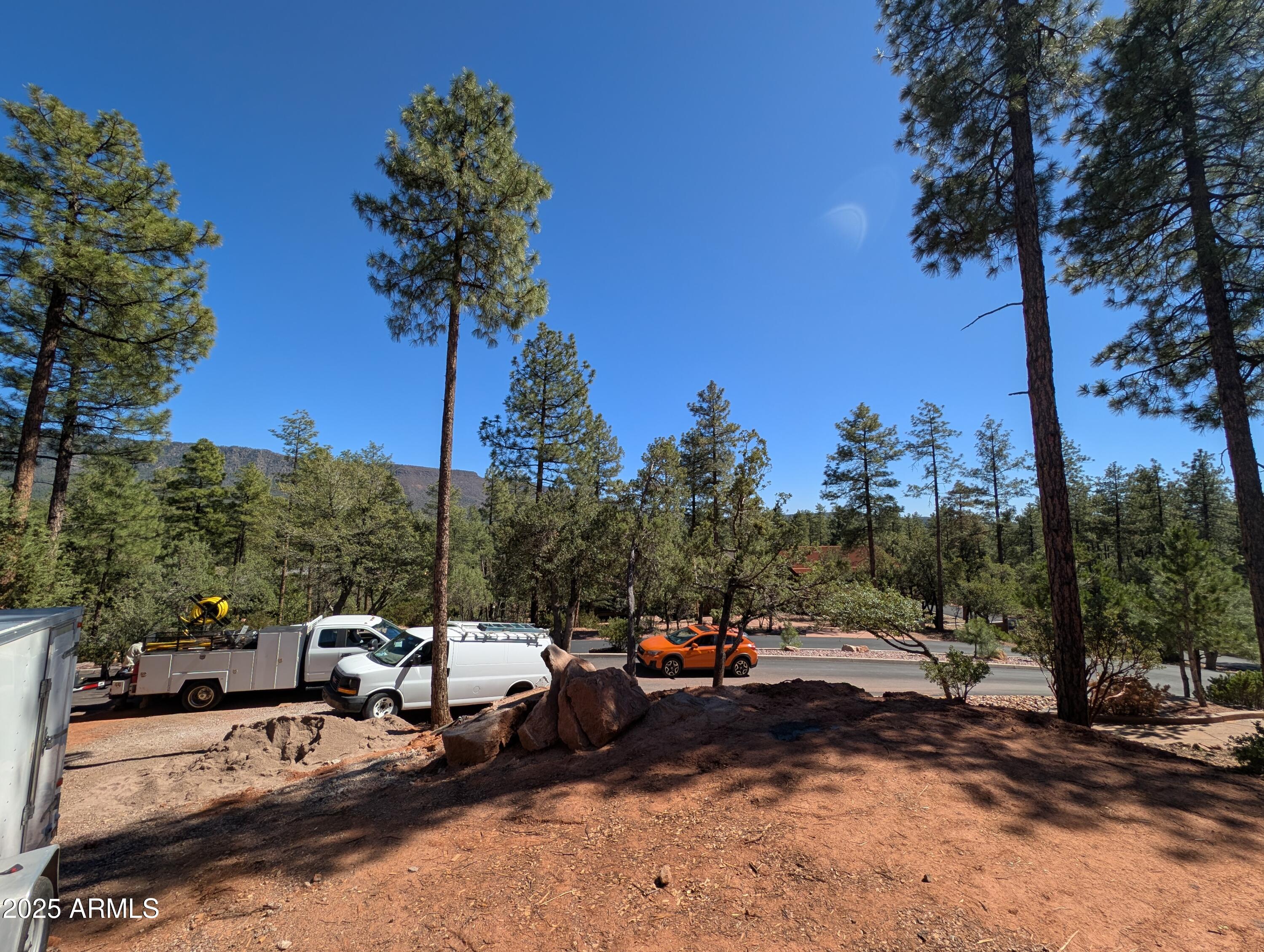 4165 West W Forest Pine, AZ 85544 - Photo 13 of 24 a view of a lake with a sitting area
