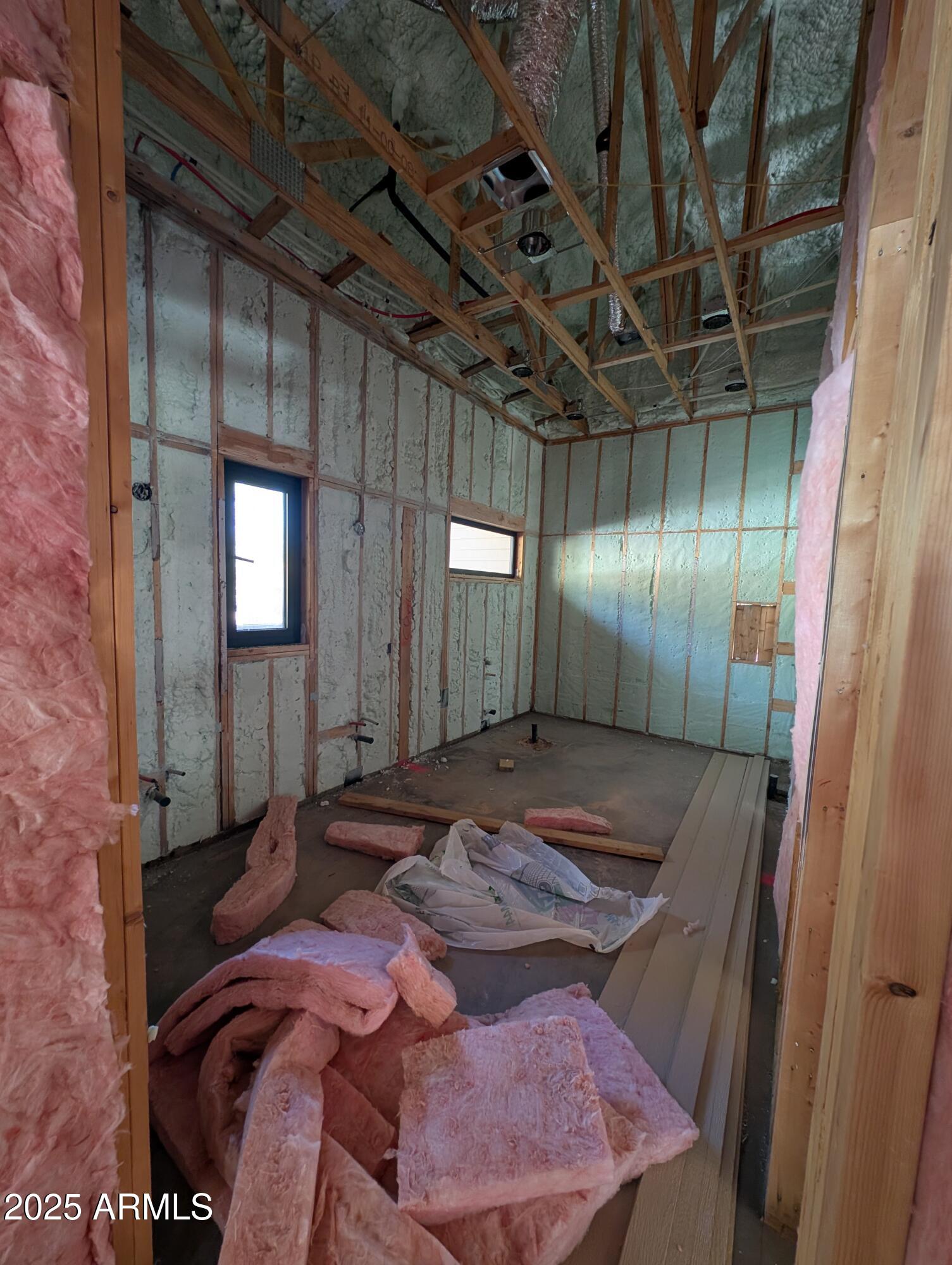 4165 West W Forest Pine, AZ 85544 - Photo 21 of 24 a bedroom with a bed and a mirror