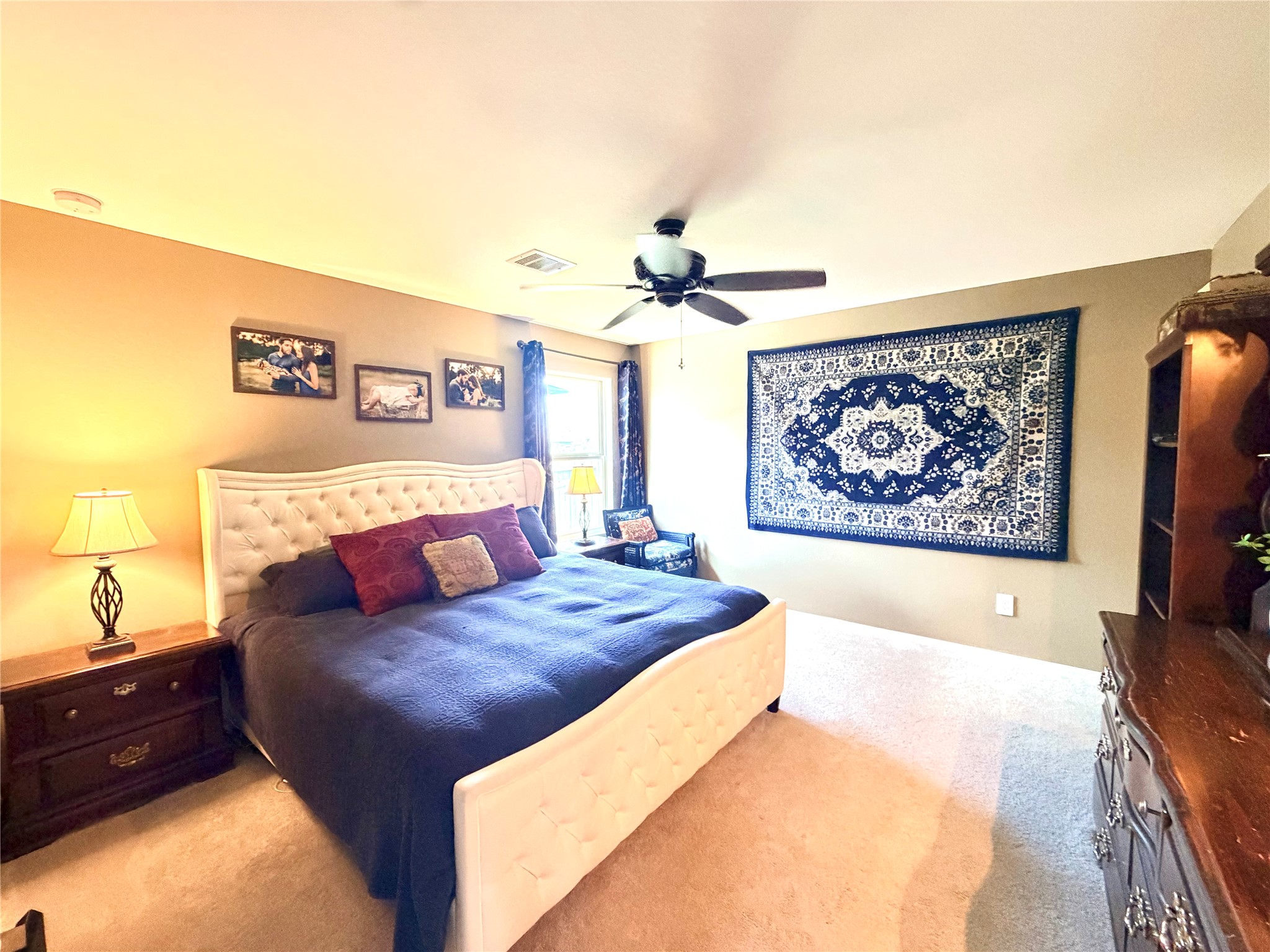 532 Flower Reed Court Magnolia, TX 77354 - Photo 20 of 43 The Owner Suite is fabulous with soft pile carpet and complementary colors! It also has a ceiling fan!