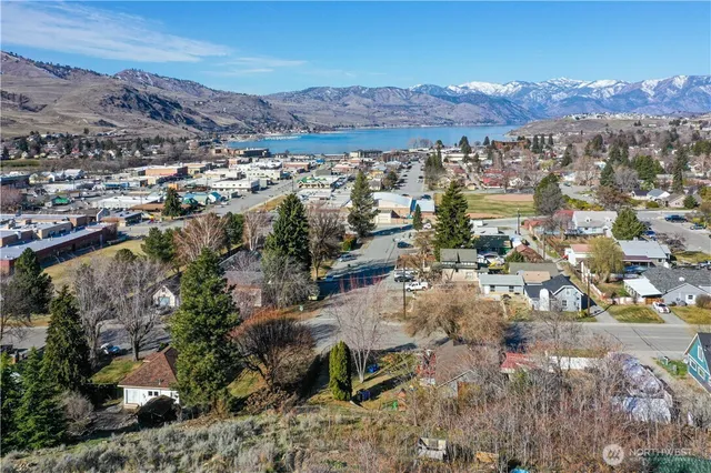 an aerial view of residential house and lake view