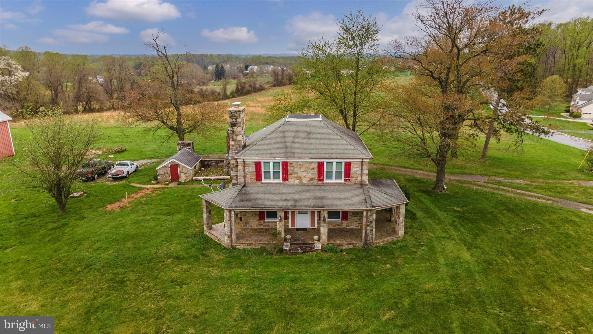 1021 Saffell Road Reisterstown, MD 21136 - Photo 18 of 57 a view of a house with a yard