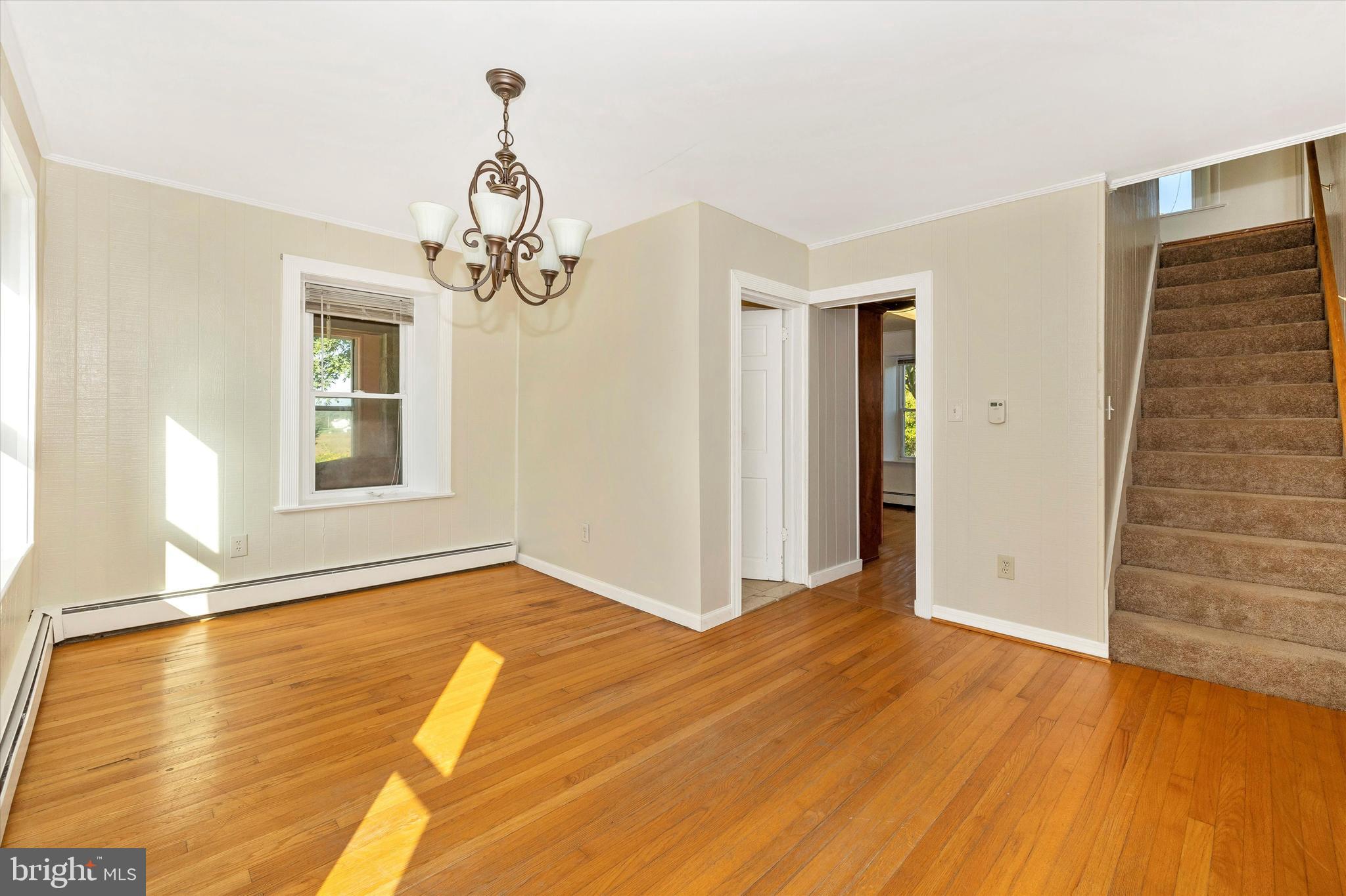 1021 Saffell Road Reisterstown, MD 21136 - Photo 35 of 57 a view of empty room with wooden floor and fan