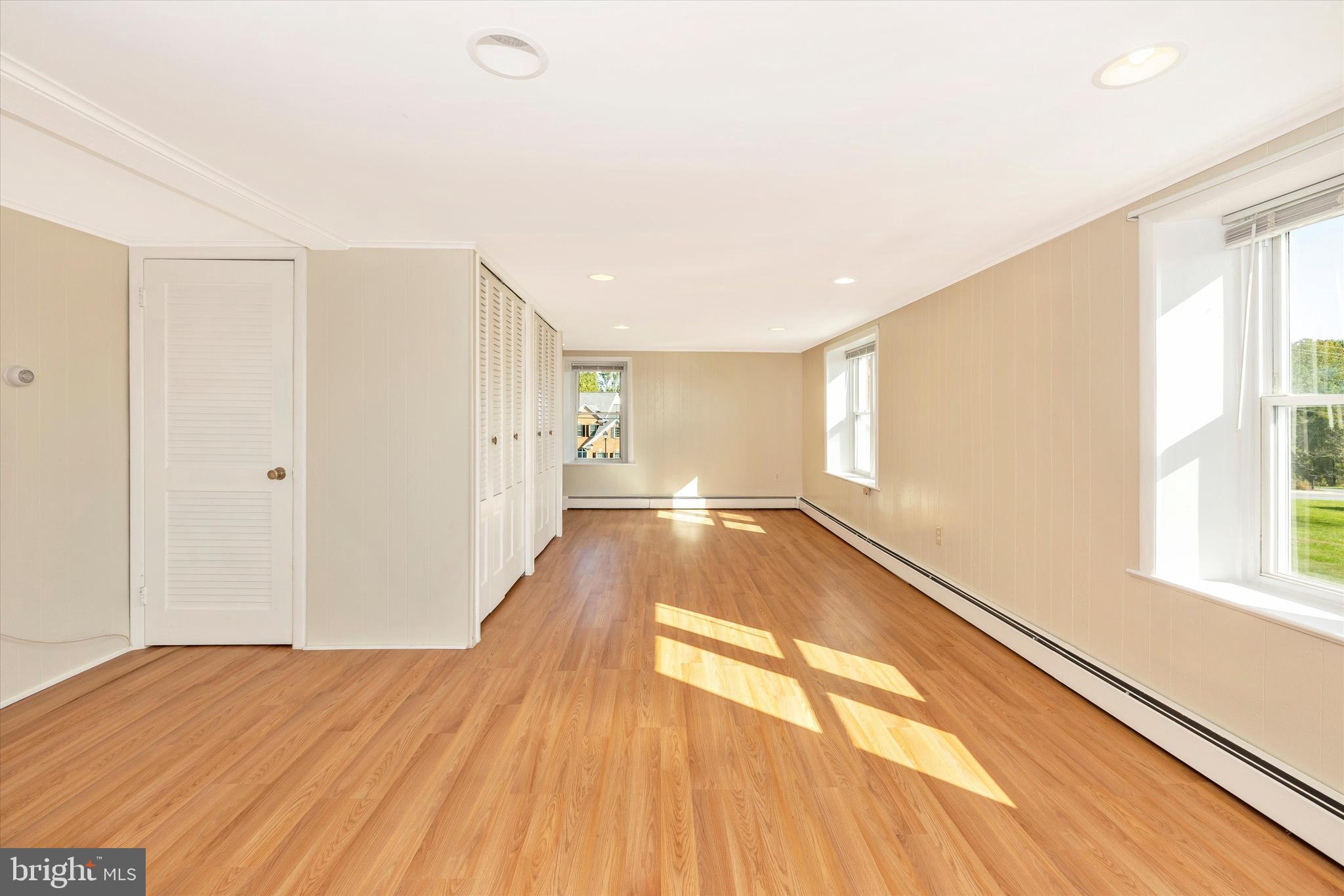 1021 Saffell Road Reisterstown, MD 21136 - Photo 49 of 57 a view of an empty room with wooden floor and a window