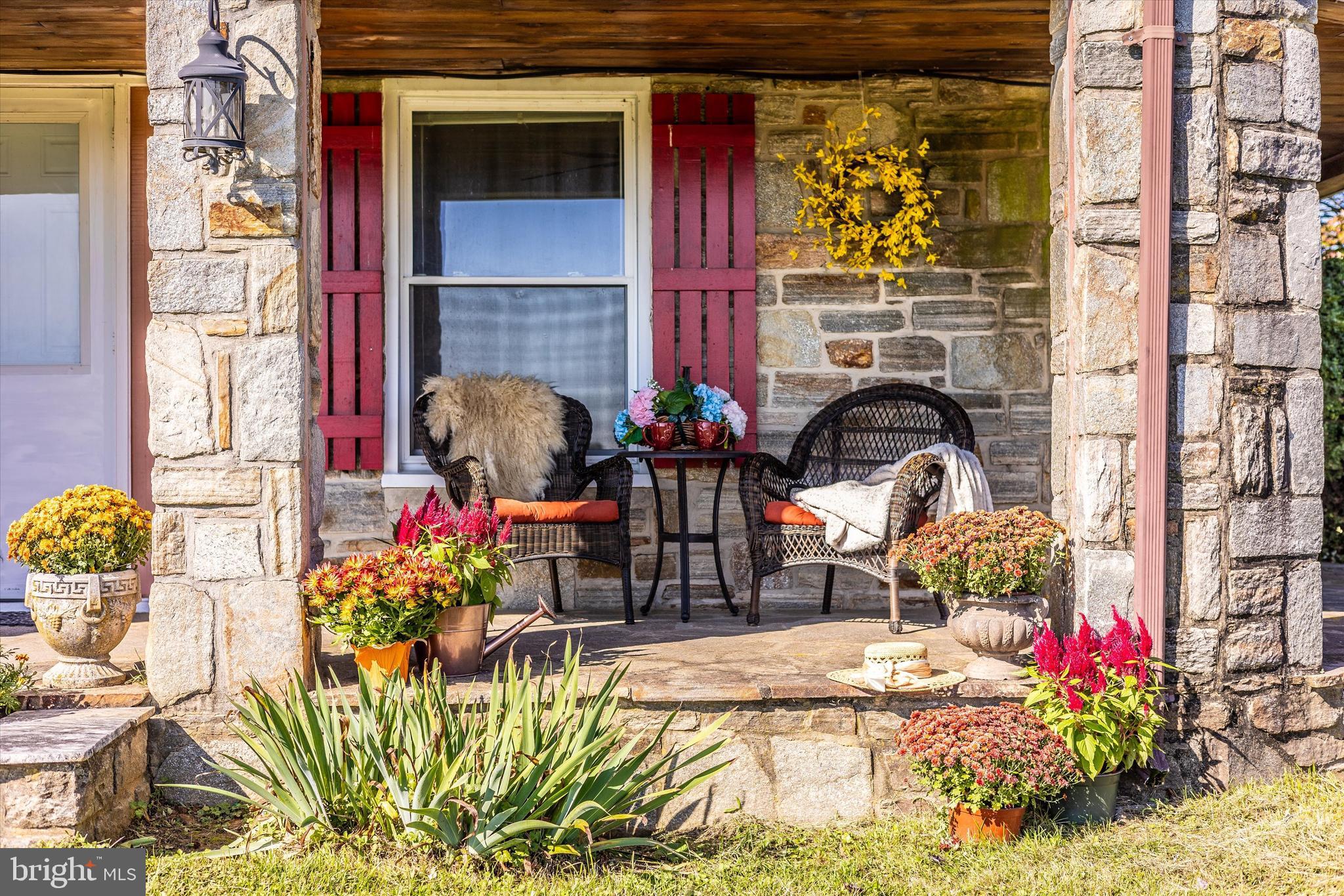 1021 Saffell Road Reisterstown, MD 21136 - Photo 9 of 57 a front view of a house with outdoor seating