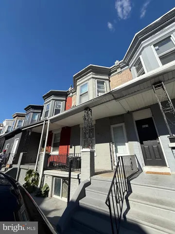 a front view of a house with a balcony