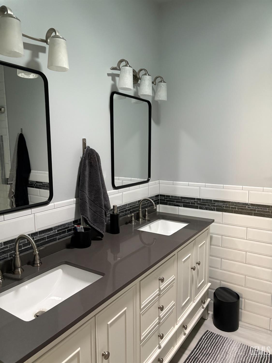 Undisclosed Address Delano, CA 93215 - Photo 12 of 23 a bathroom with a sink and a mirror