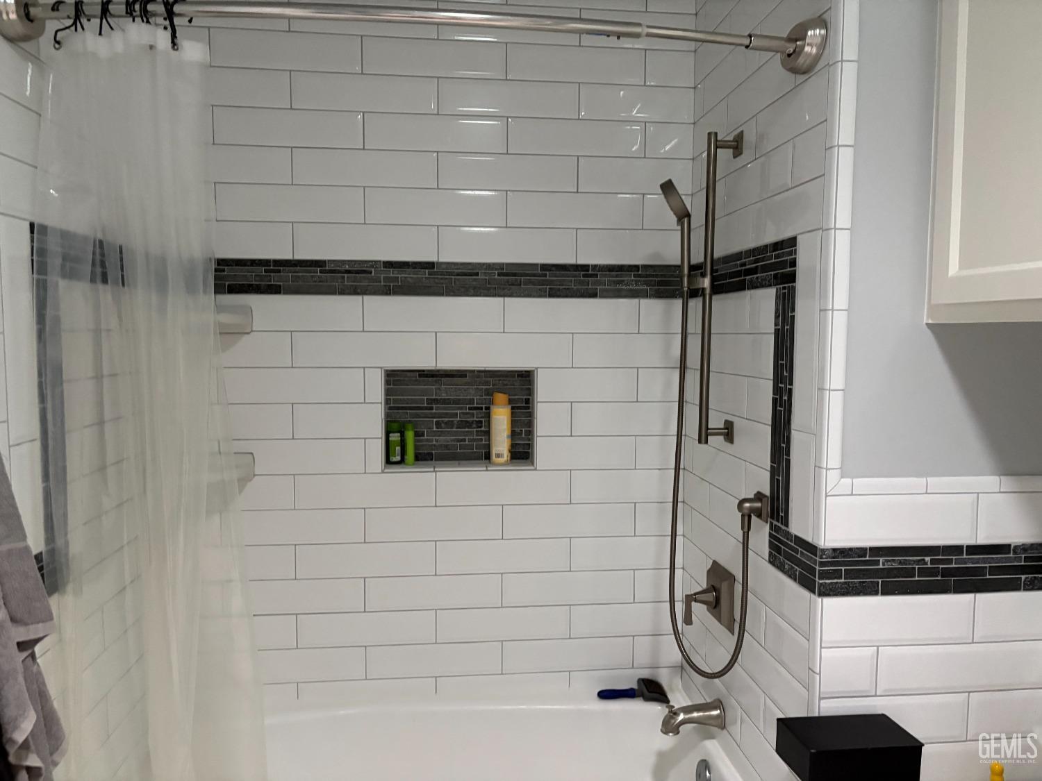 Undisclosed Address Delano, CA 93215 - Photo 13 of 23 a bathroom with a shower and a sink