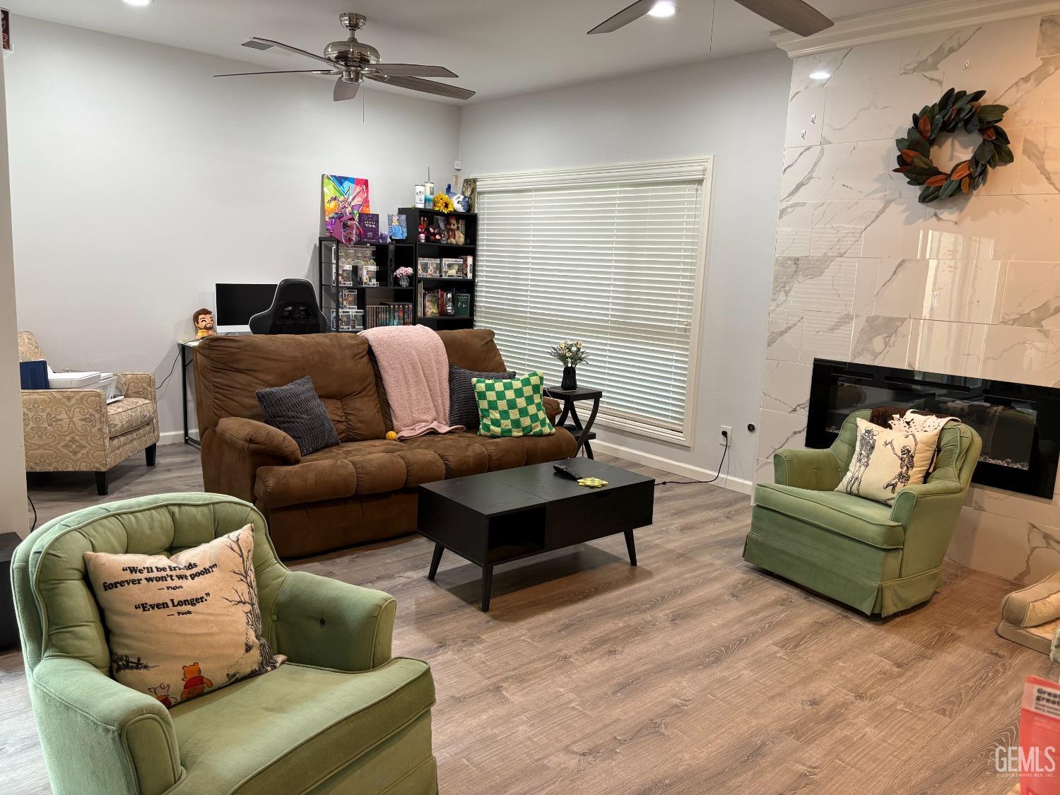 Undisclosed Address Delano, CA 93215 - Photo 3 of 23 a living room with furniture and a flat screen tv