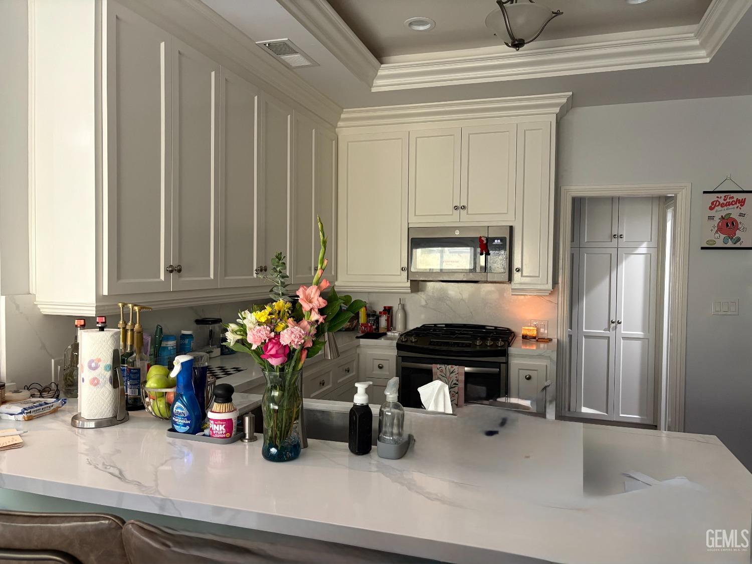 Undisclosed Address Delano, CA 93215 - Photo 5 of 23 a kitchen with refrigerator and stove