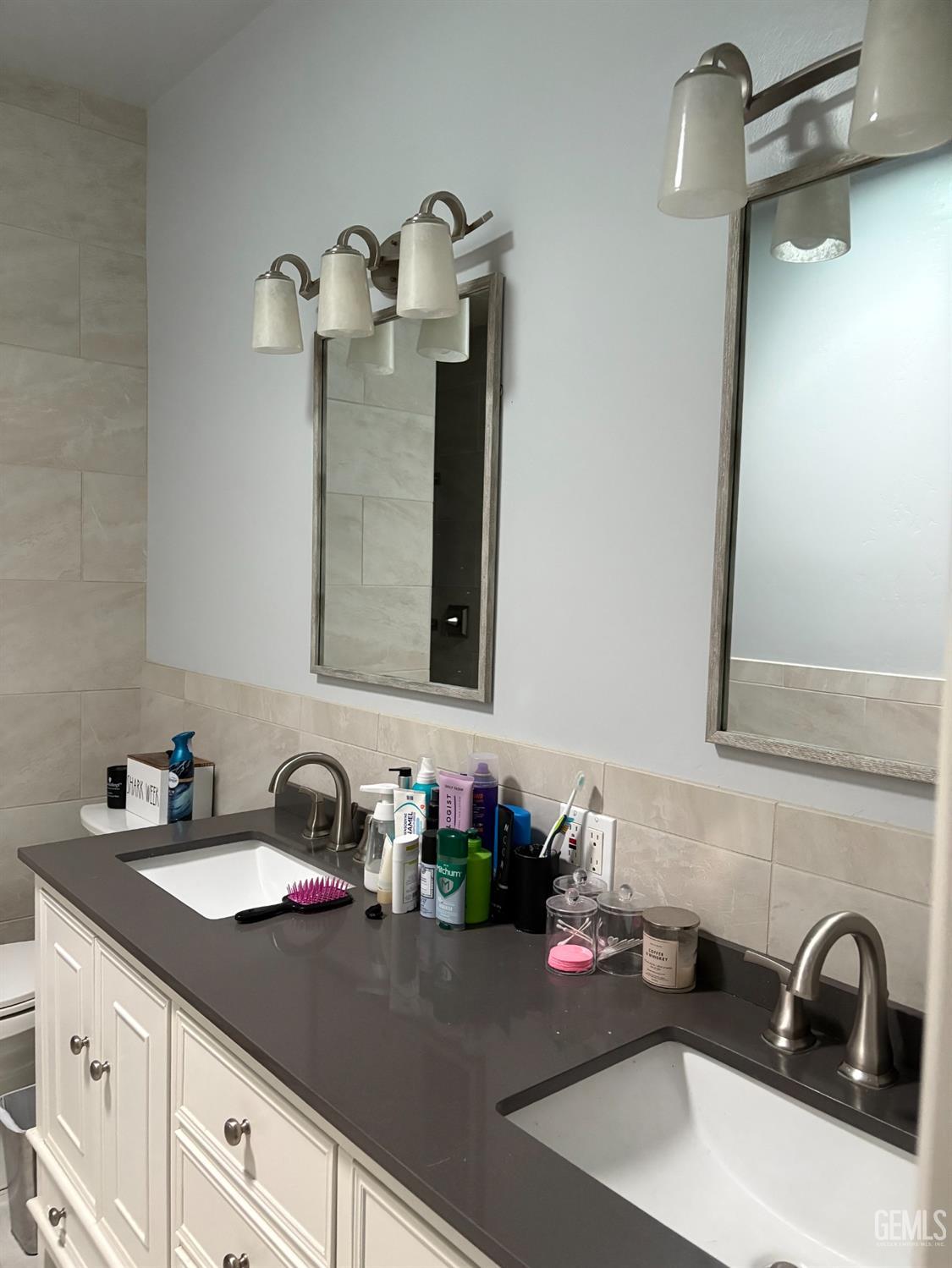 Undisclosed Address Delano, CA 93215 - Photo 9 of 23 a bathroom with a sink and a mirror